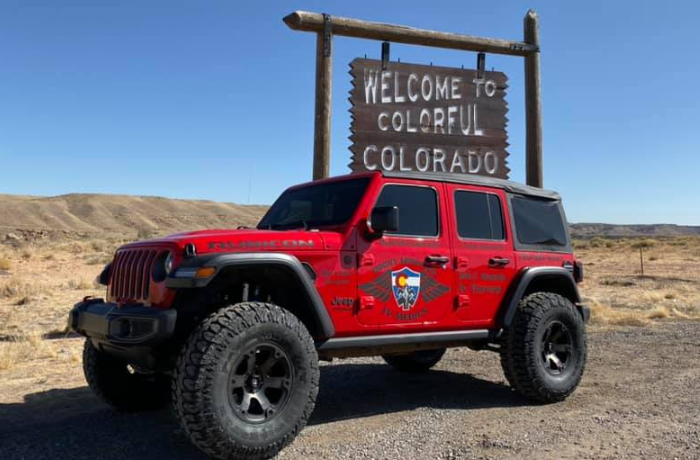 Rocky Mountain IV Medics red Jeep in Colorado